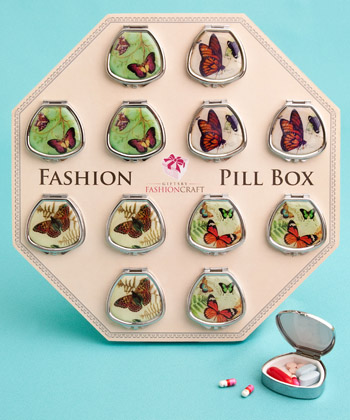 Fan-shaped pill boxes in pretty butterfly designs-Fan-shaped pill boxes in pretty butterfly designs